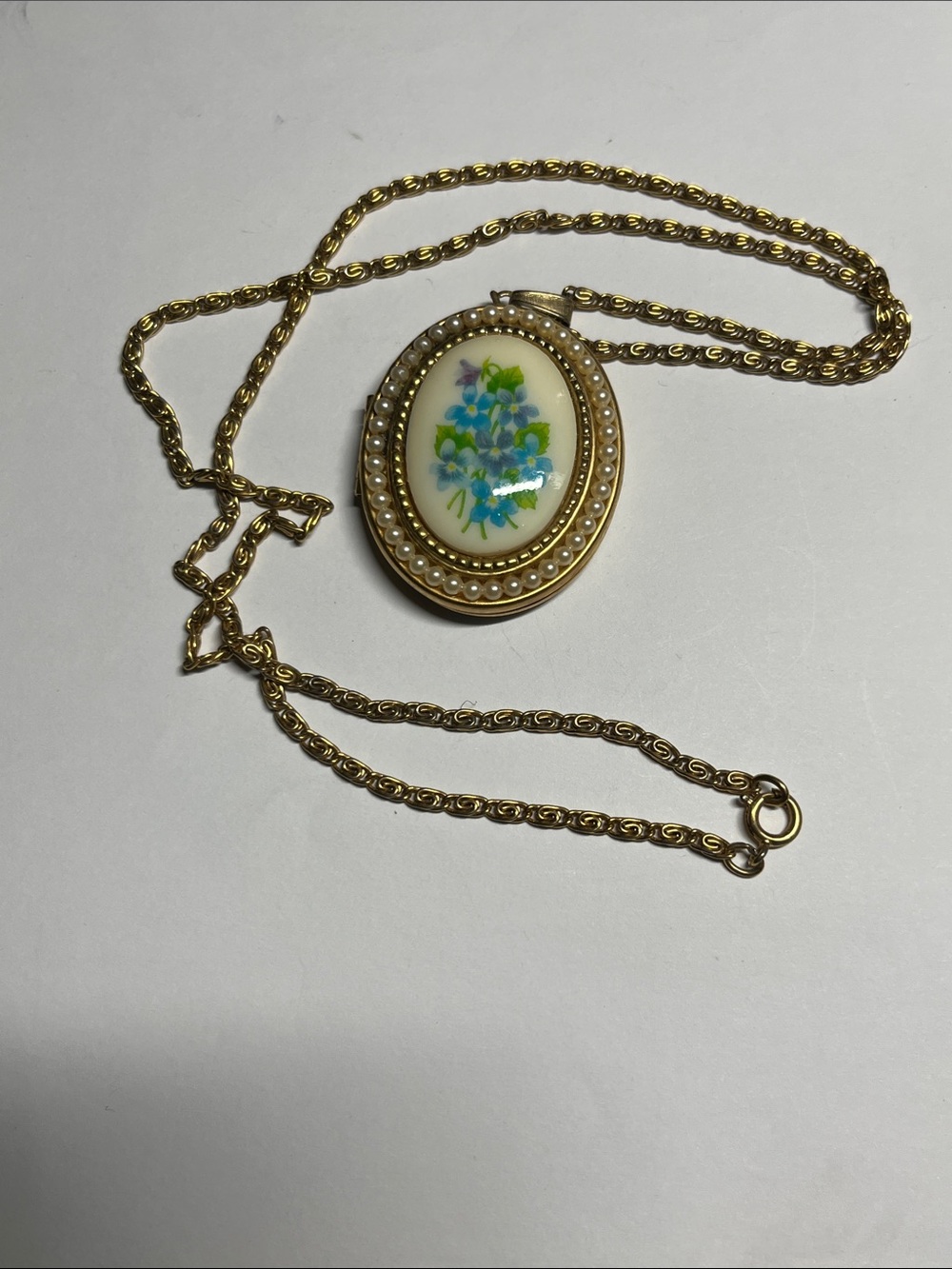 Avon Gold-tone Floral Porcelain Locket Necklace with Blue and Green Motif